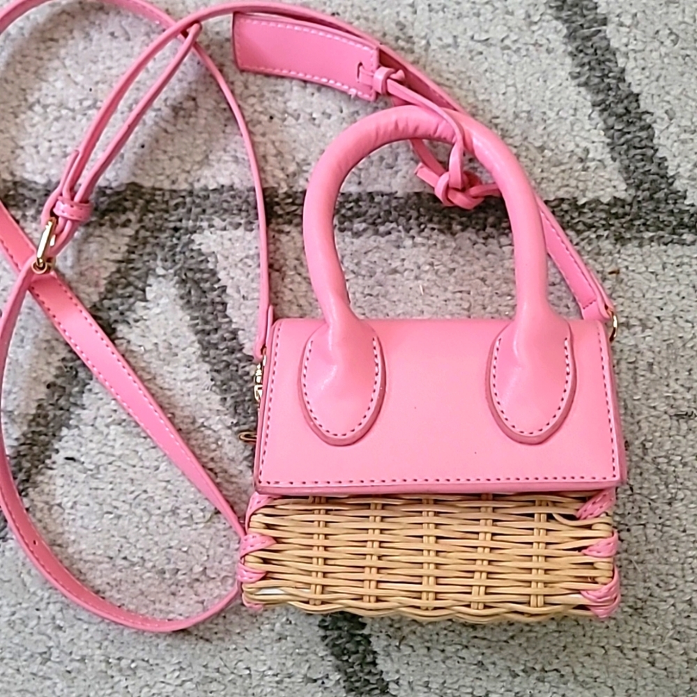 Francesca's pink and wicker mini crossbody bag